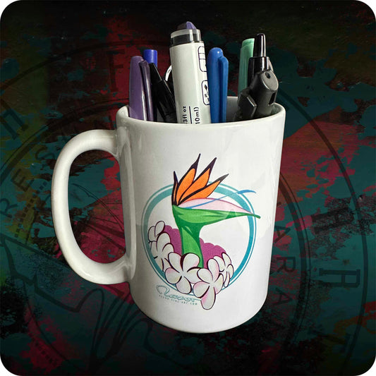 Bird of paradise graphic on white ceramic mug with pens in it over dark abstract paint background.