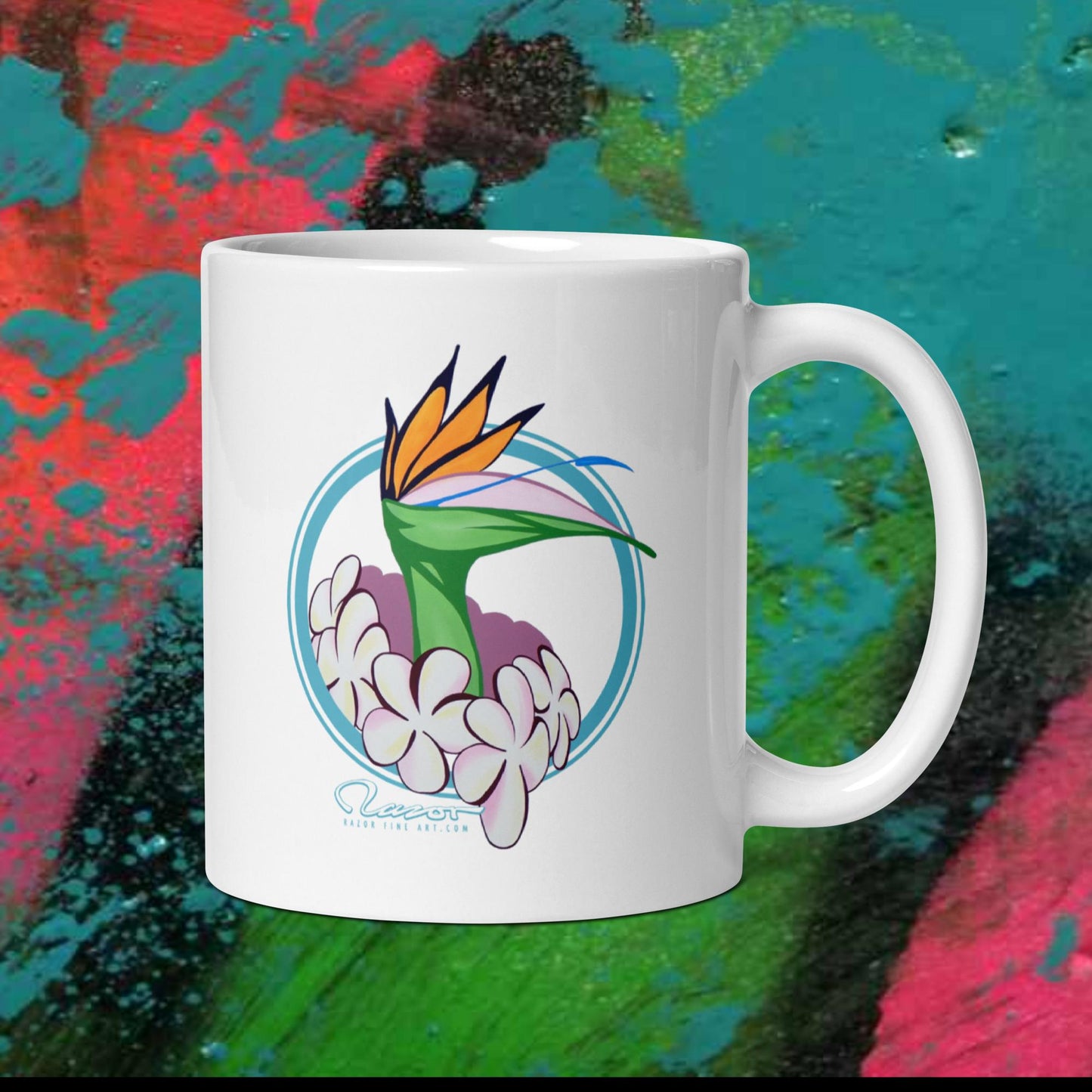 White ceramic mug with graphic design on it.