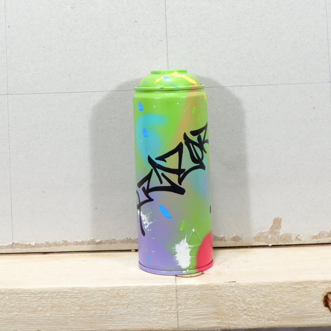 Spent spray paint can painted with abstract graffiti